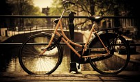 Amsterdam. Romantic canal bridge, bike