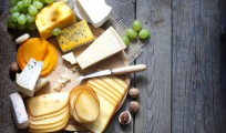 Various types of cheese with empty space background concept